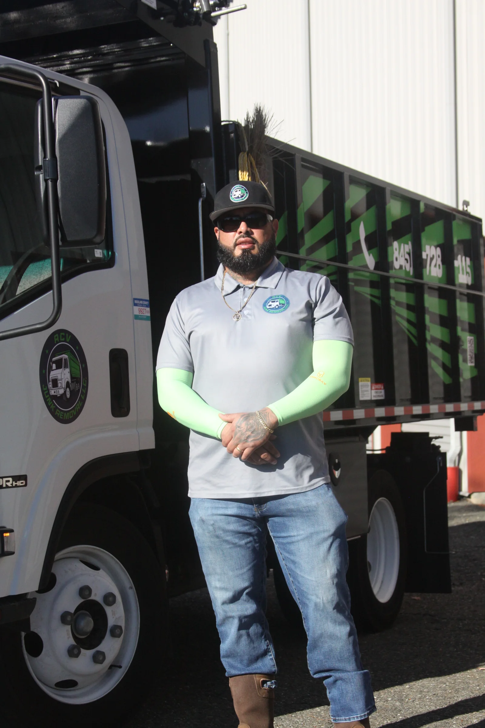 Andy from ACV Junk Removal standing by the truck
